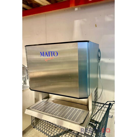 Maito Novo maidon annostelija kahdella annostelijalla -